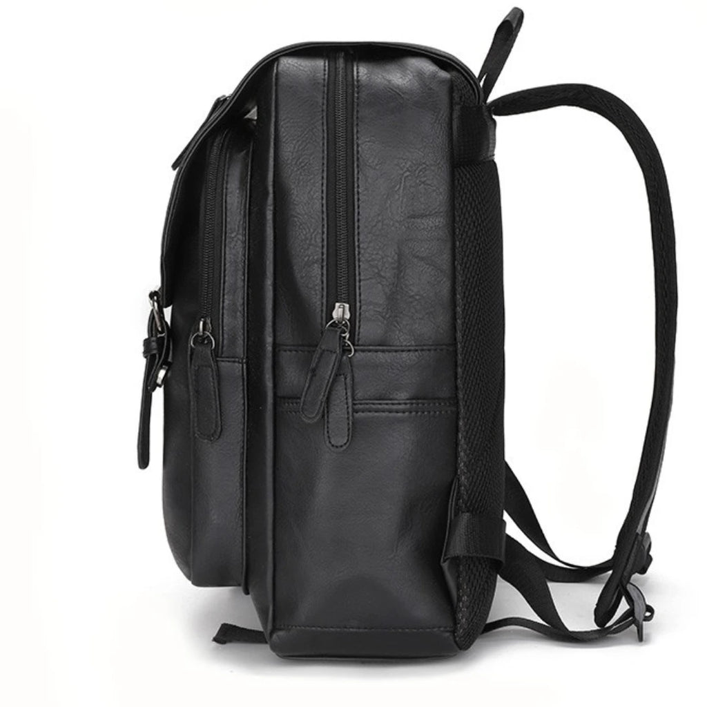 Black leather backpack on a white background