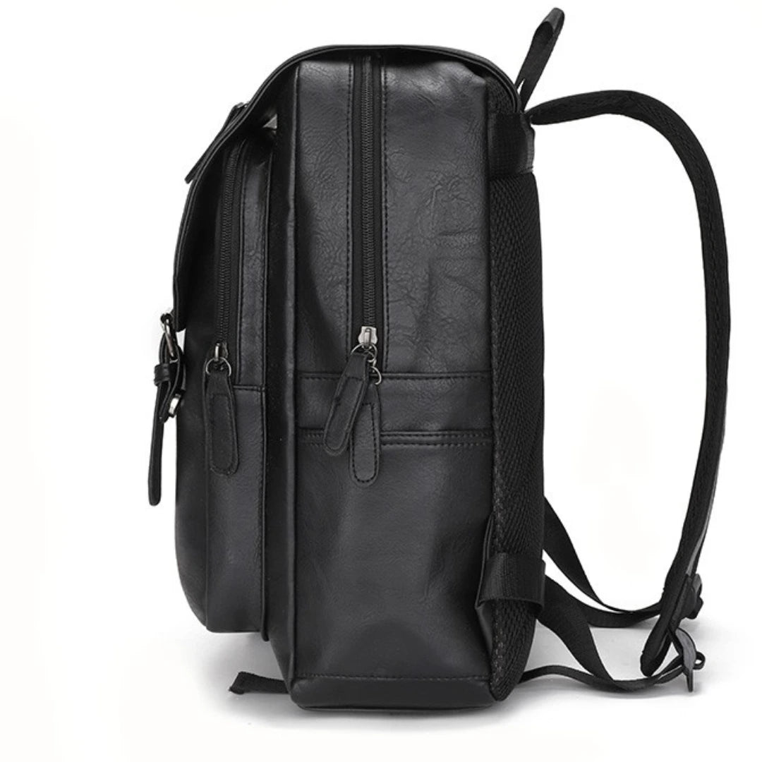 Black leather backpack on a white background