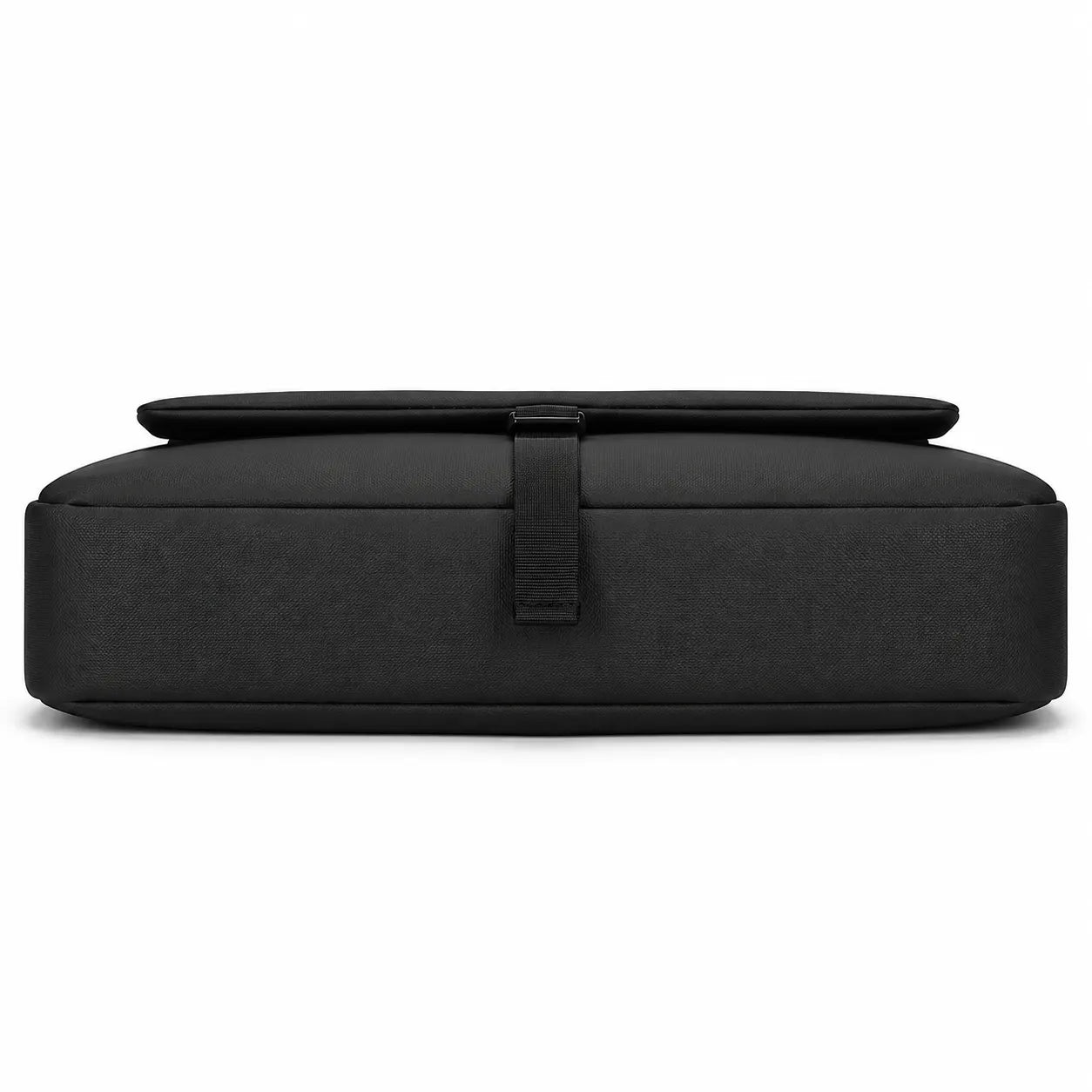 A black rectangular padded travel pillow with a matching flat top lid and a central strap closure, shown against a plain white background.