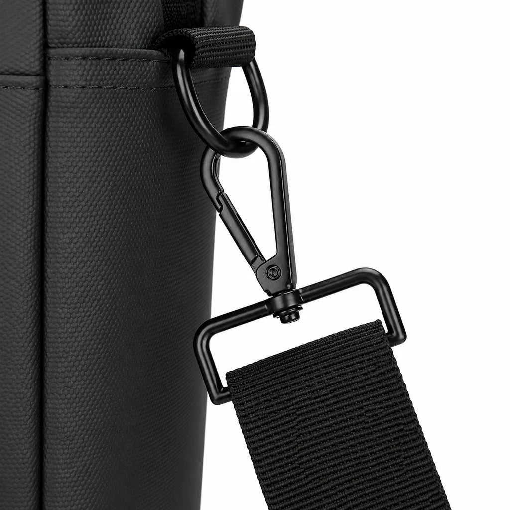 Close-up of a black textured bag with a black adjustable shoulder strap attached via a metal carabiner and D-ring, shown on a white background.