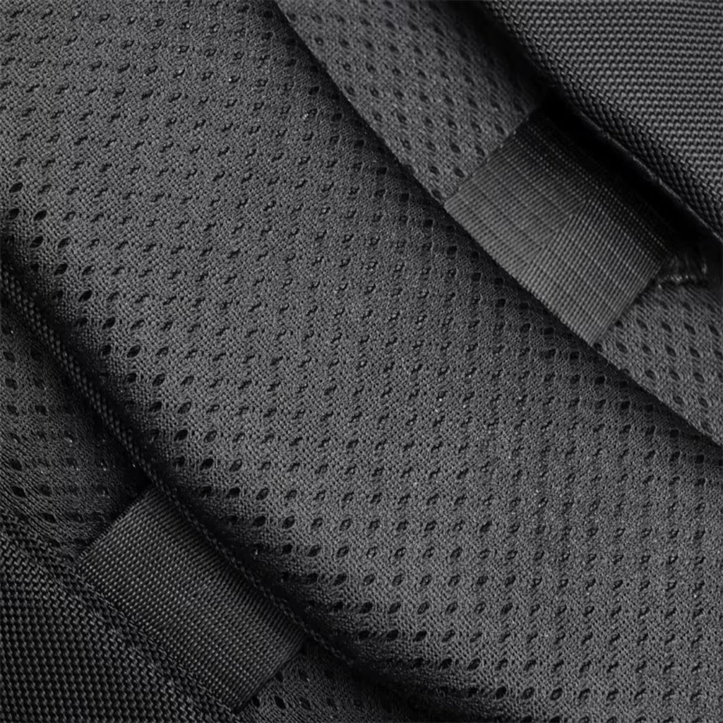 Close-up of dark gray textured fabric with a subtle pattern