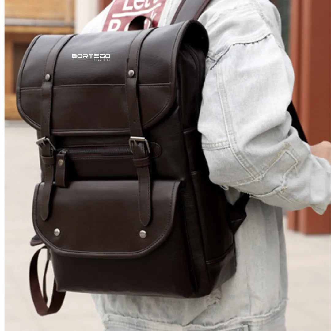 Brown backpack with 'Bortego' branding worn by a person.