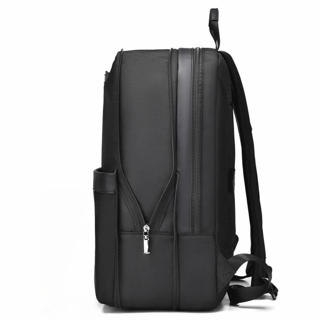 Black backpack on a white background