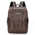 Brown leather backpack with visible brand logo on a white background