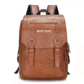 Brown leather backpack with visible brand logo on a white background