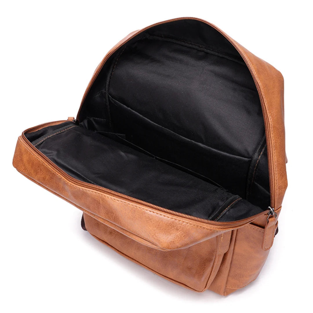 Brown leather backpack with open front compartment on a white background