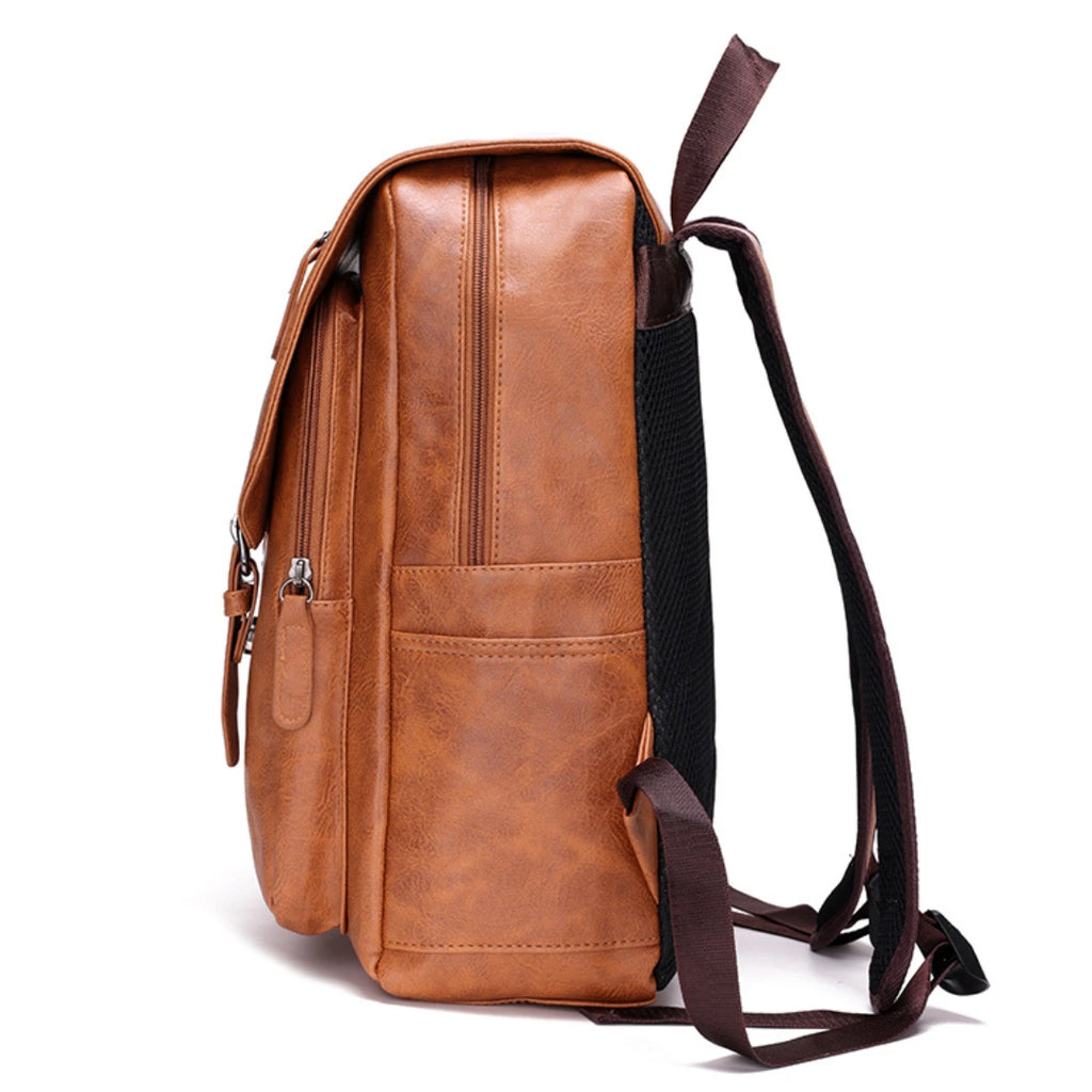 Brown leather backpack on a white background