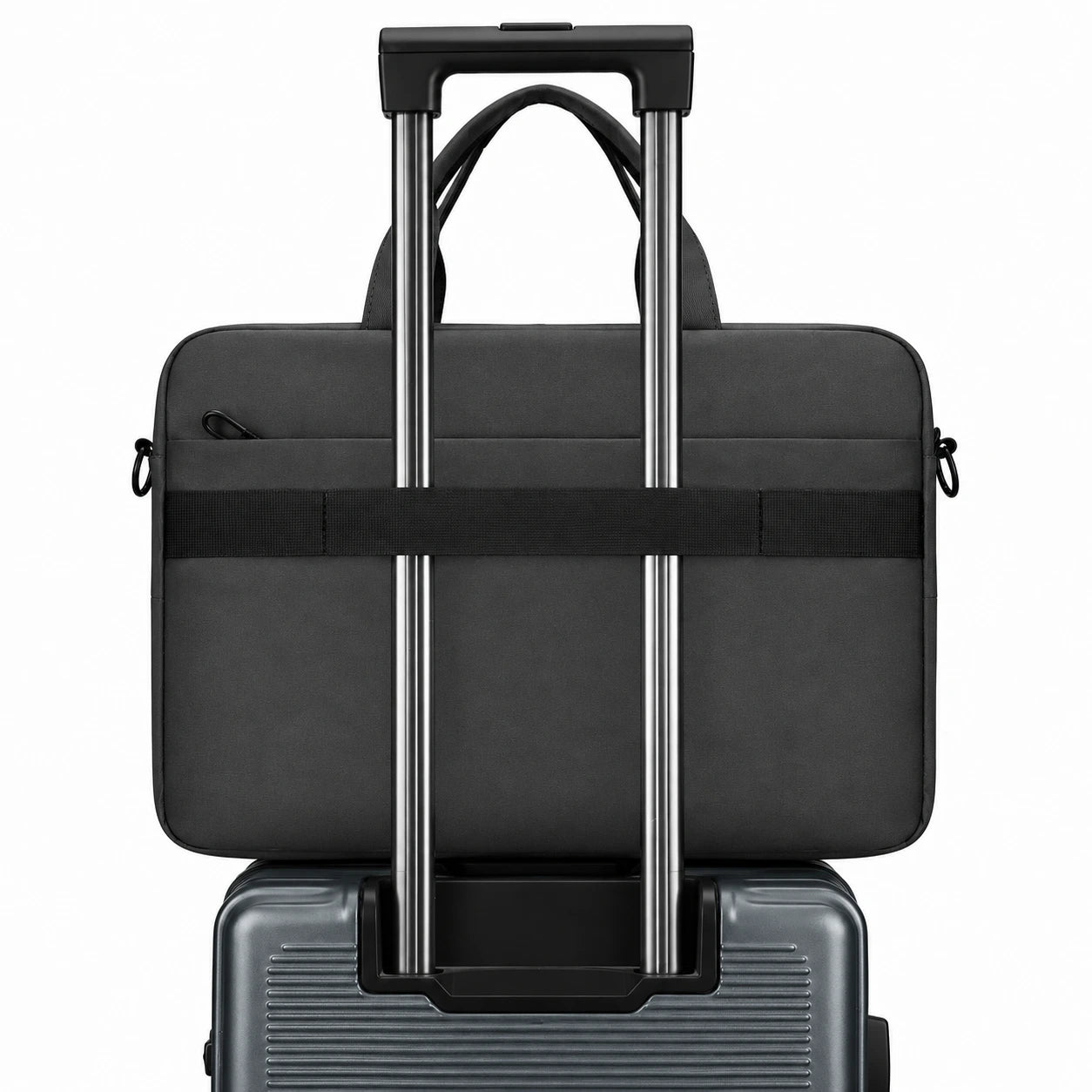 A black laptop bag with a telescoping handle and side straps, shown stacked on top of a gray rolling suitcase against a plain white background.