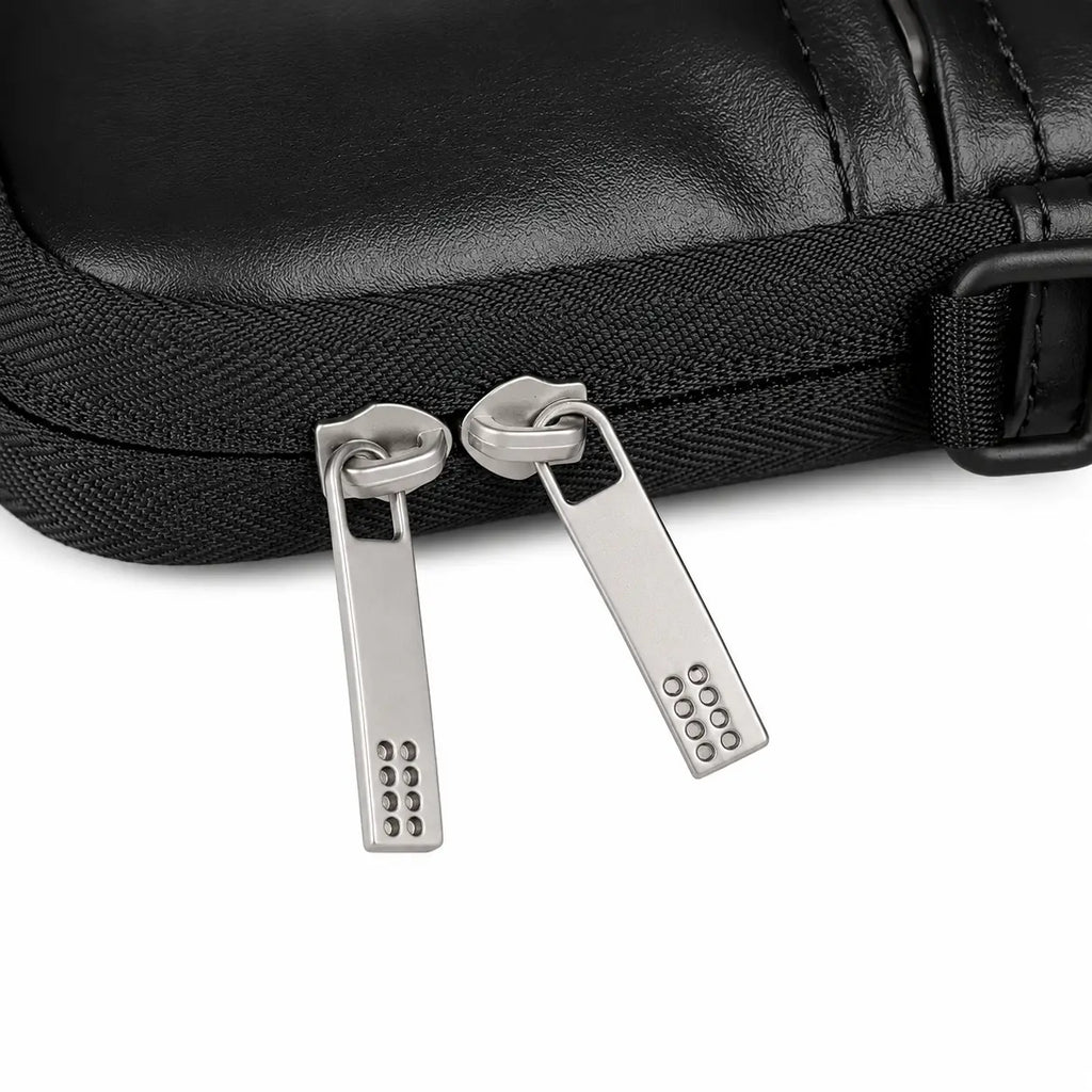 Close-up of a black zippered pouch or case with two silver metal zipper pulls on a white background.