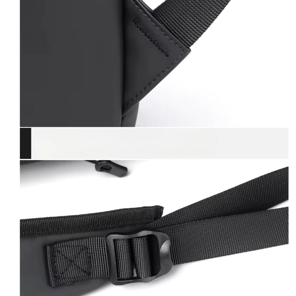 Close-up of a black strap with a buckle on a white background