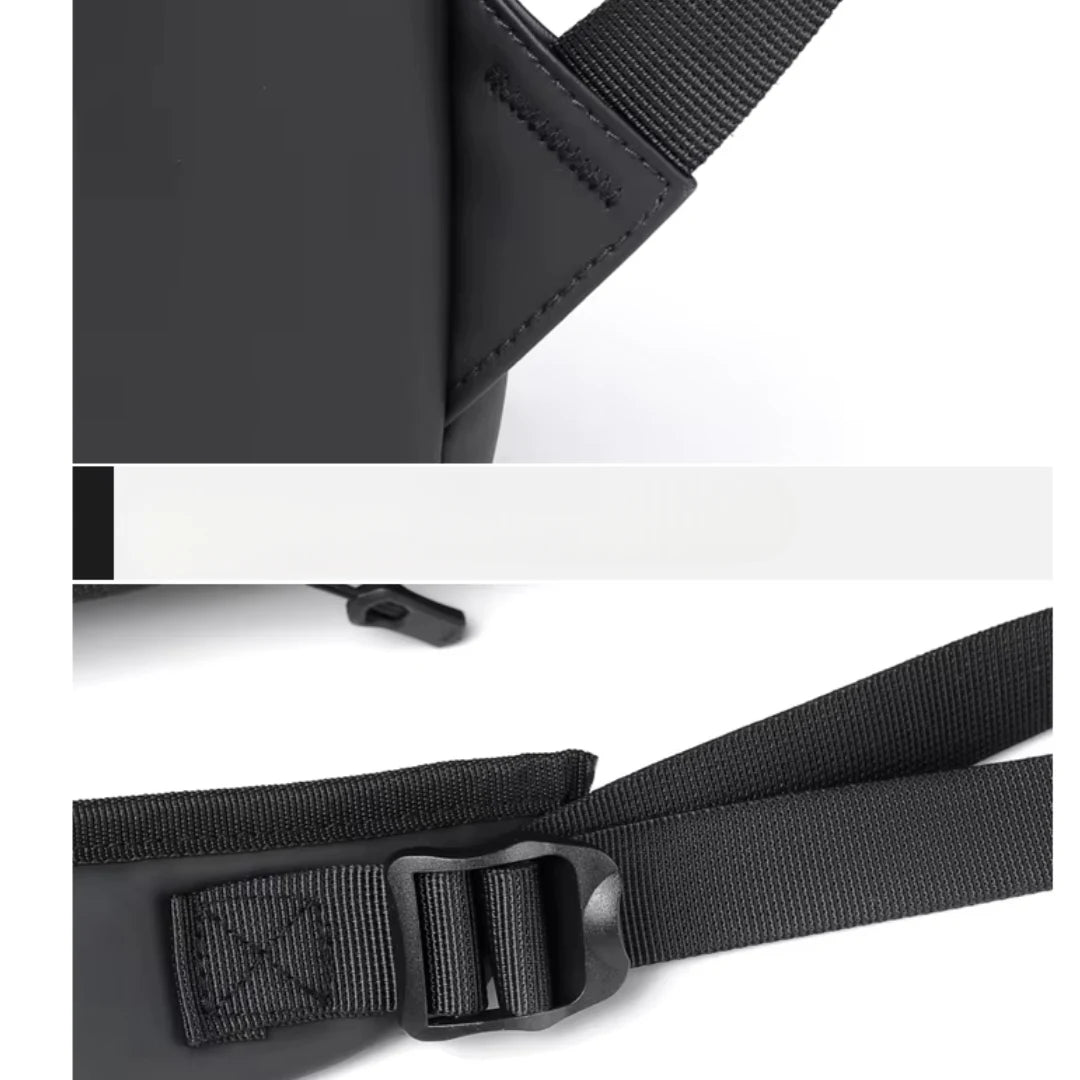 Close-up of a black strap with a buckle on a white background
