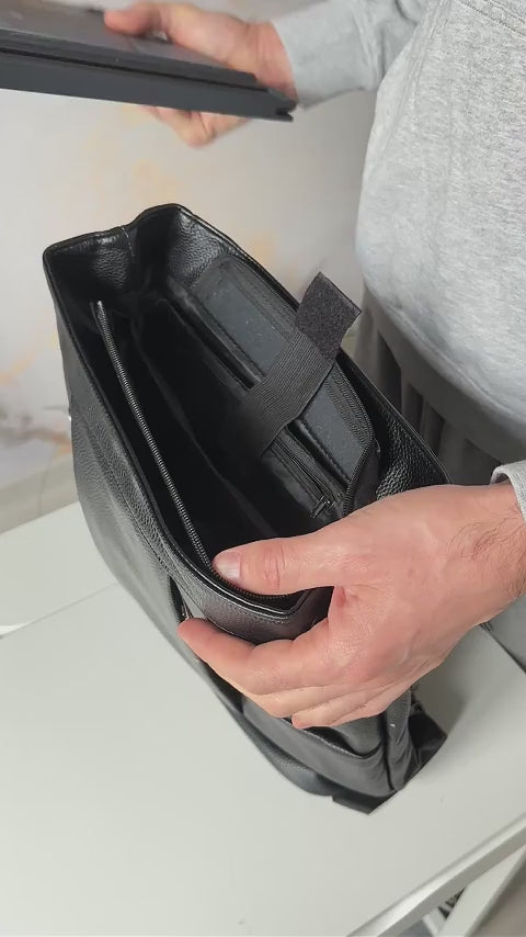 black leather backpack laptop compartment