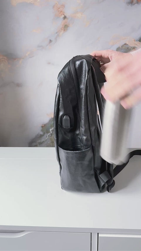 city black leather backpak water pocket
