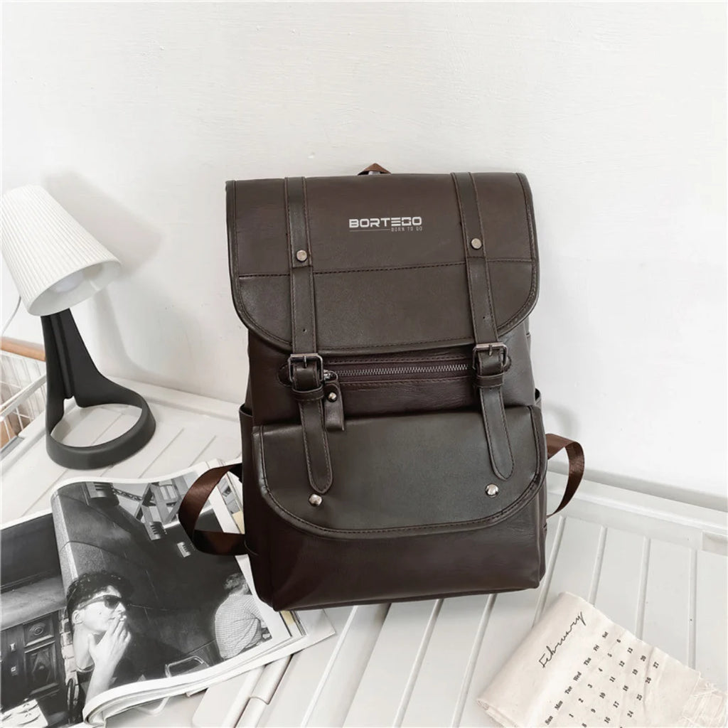 Brown backpack with 'Borteco' branding on a white surface