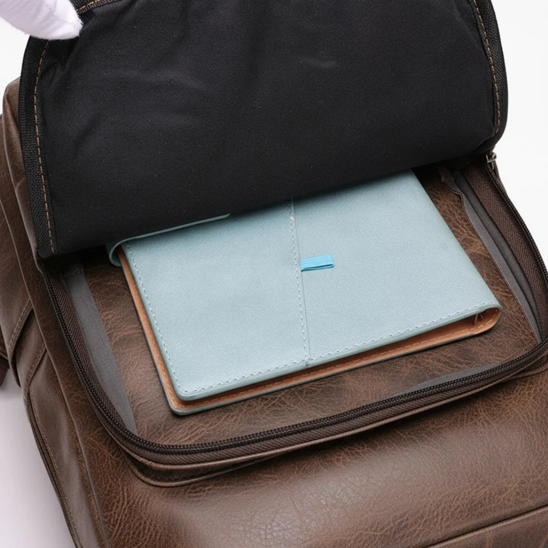 Brown leather backpack with a light blue pouch inside on a white background