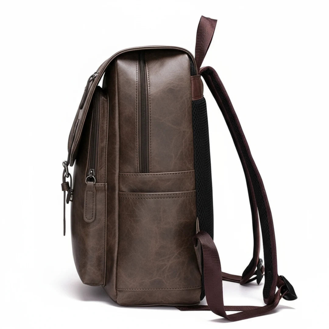 Brown leather backpack on a white background